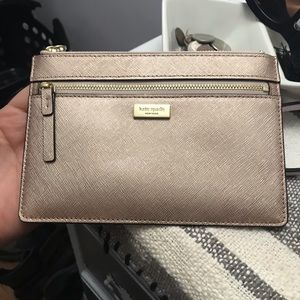 Super cute rose gold Kate spade wristlet